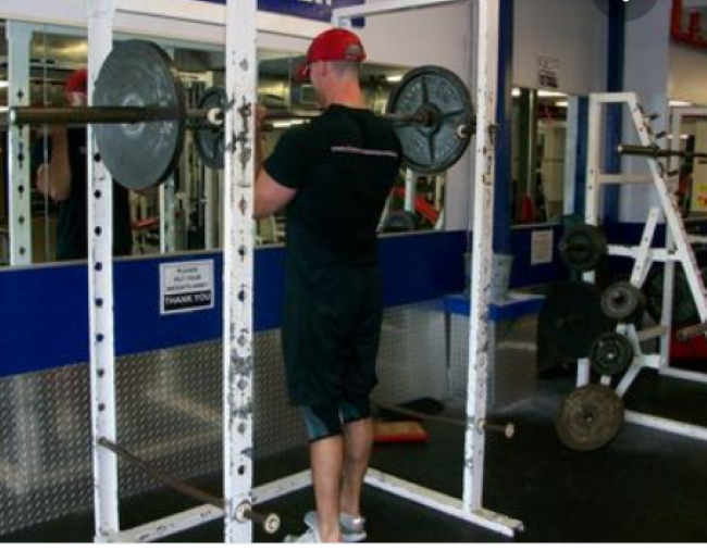 Why Do People Do Bicep Curls In The Squat Rack?